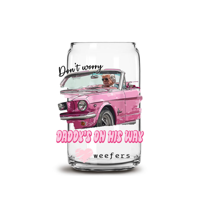a glass jar with a picture of a dog driving a pink car