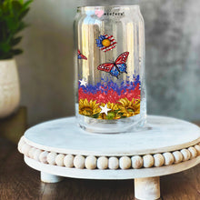 Load image into Gallery viewer, a glass jar with butterflies painted on it
