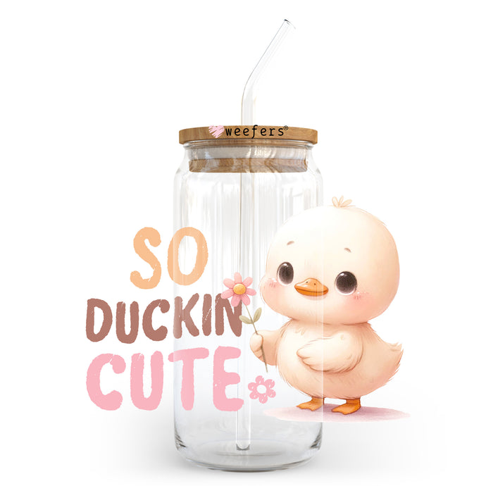 a cute little chick holding a flower in a jar