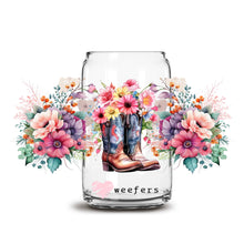 Load image into Gallery viewer, a glass jar with flowers and boots on it

