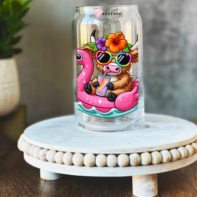 a glass jar with a picture of a cow riding a pink flamingo