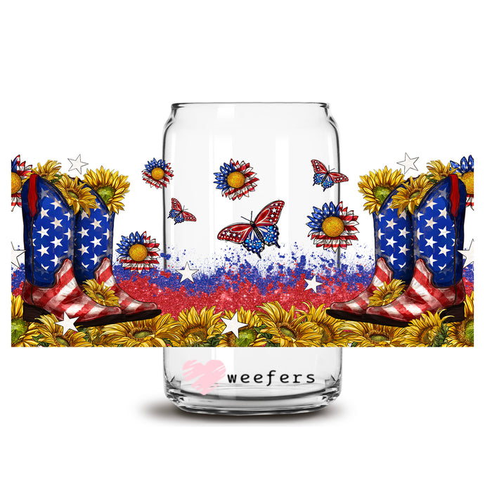 a glass jar with a patriotic design and sunflowers