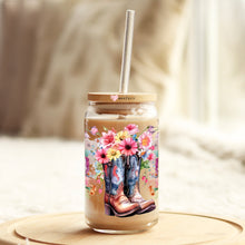 Load image into Gallery viewer, a mason jar with a straw in it with a picture of boots and flowers on
