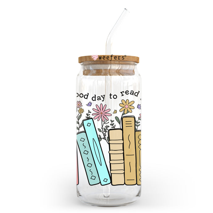 a glass jar with a straw in it that says good day to read