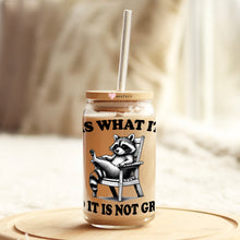 Load image into Gallery viewer, a mason jar with a raccoon on it and a straw sticking out of
