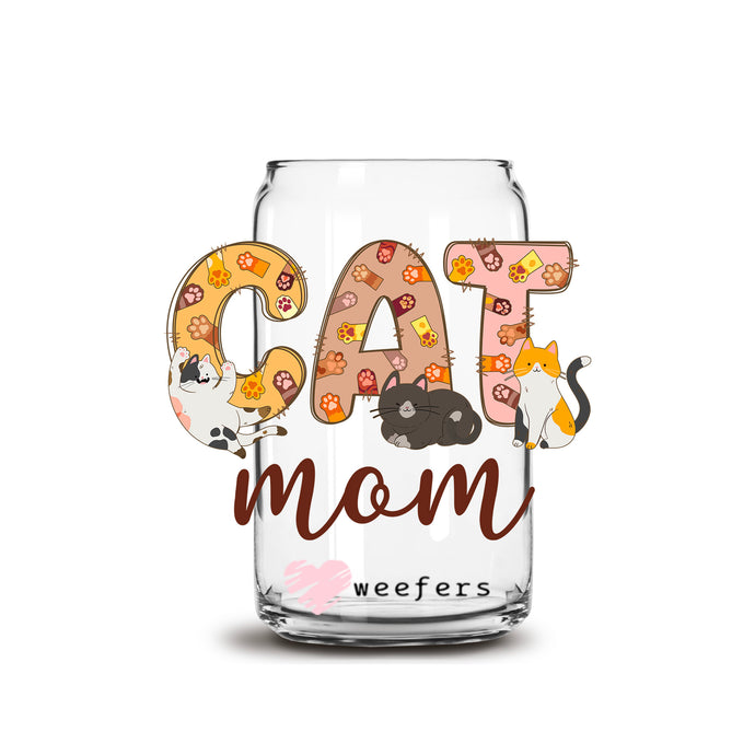 a glass jar with the word cat mom on it