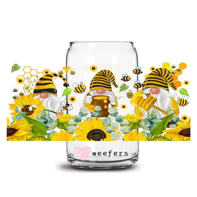 a glass jar filled with bees and sunflowers