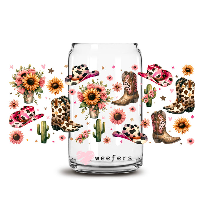a glass jar with cowboy boots and sunflowers on it