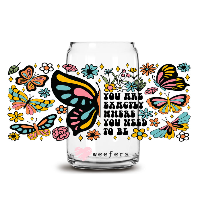 a glass with a picture of a butterfly on it