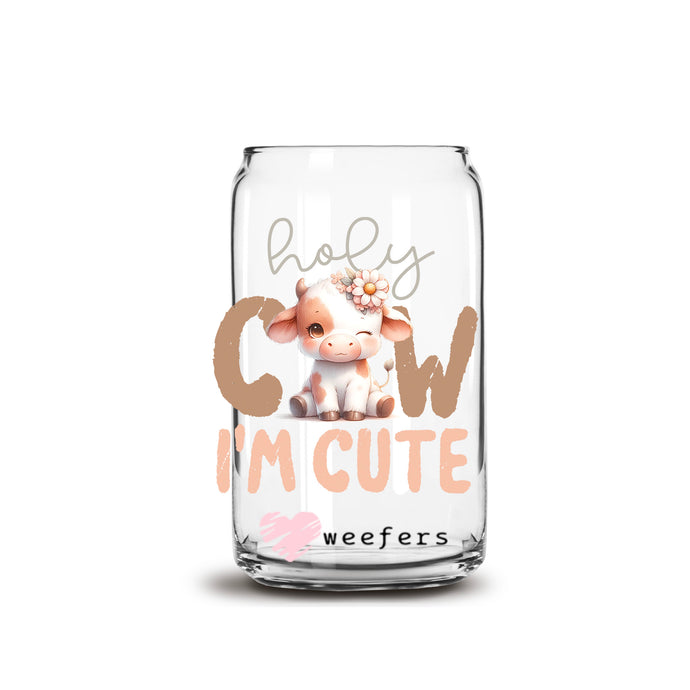 a glass jar with a picture of a cow on it