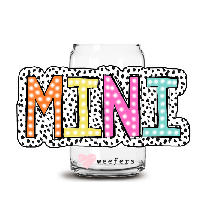 a glass jar with the word mine painted on it