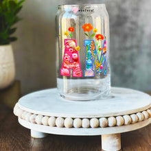 Load image into Gallery viewer, a glass jar with the word love painted on it
