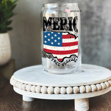 Load image into Gallery viewer, a glass jar with the american flag painted on it

