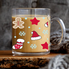 Load image into Gallery viewer, a glass mug with a gingerbread design on it
