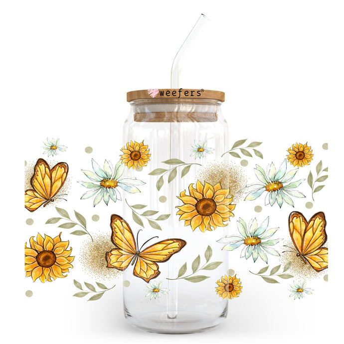 a glass jar with a straw and a straw in it with sunflowers and