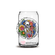 Load image into Gallery viewer, a glass jar with a skeleton and flowers on it

