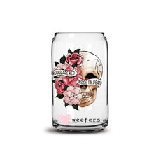 Load image into Gallery viewer, a glass jar with a skull and flowers on it
