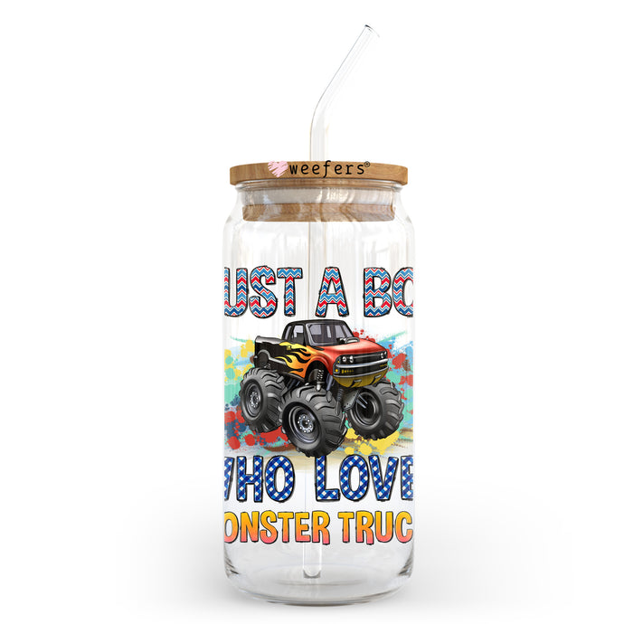 a glass jar with a straw in it with a monster truck on it