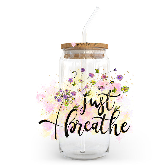 a mason jar with a straw in it that says just breathe