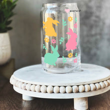 Load image into Gallery viewer, a glass jar sitting on top of a wooden table
