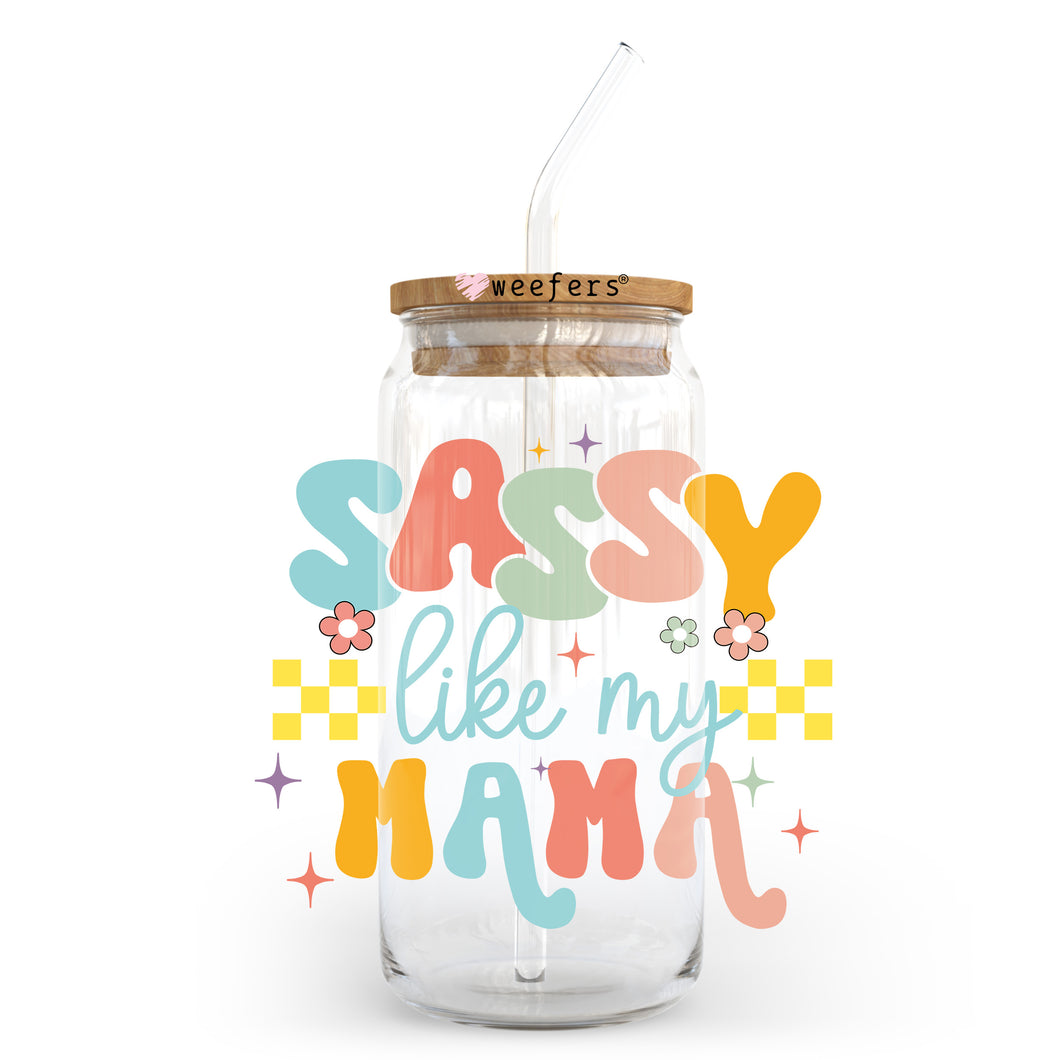 a glass jar with a straw in it that says sasy like my mama