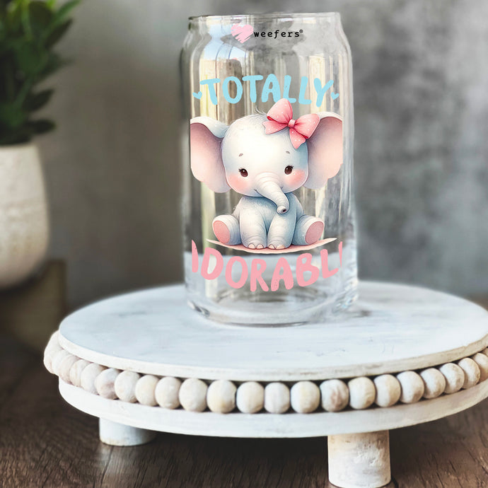 a glass jar with a picture of an elephant on it