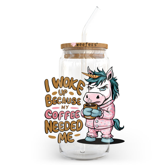 a glass jar with a unicorn drinking coffee