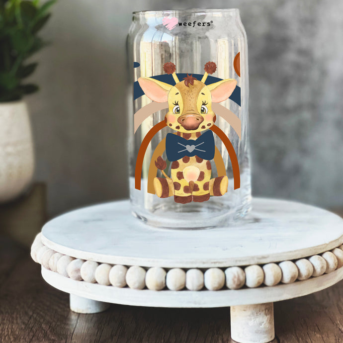 a glass jar with a cartoon giraffe on it