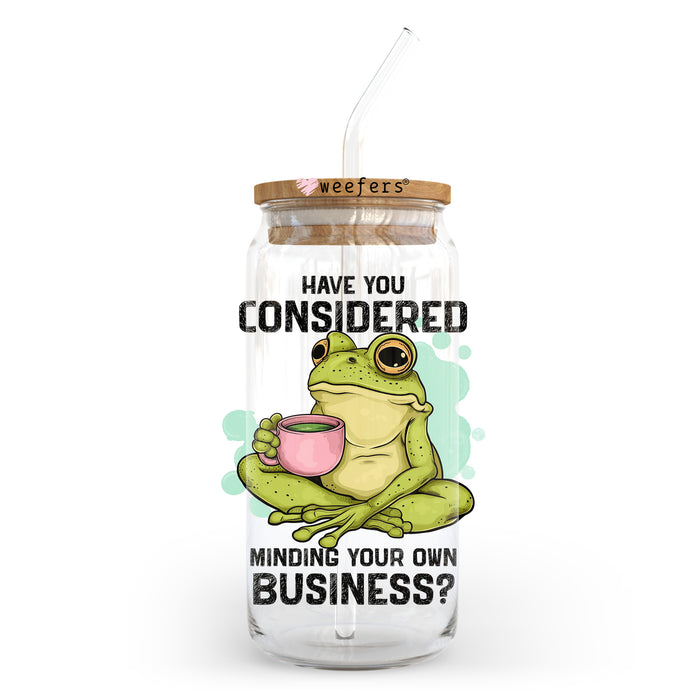 a glass jar with a straw in it that says have you considered minding your