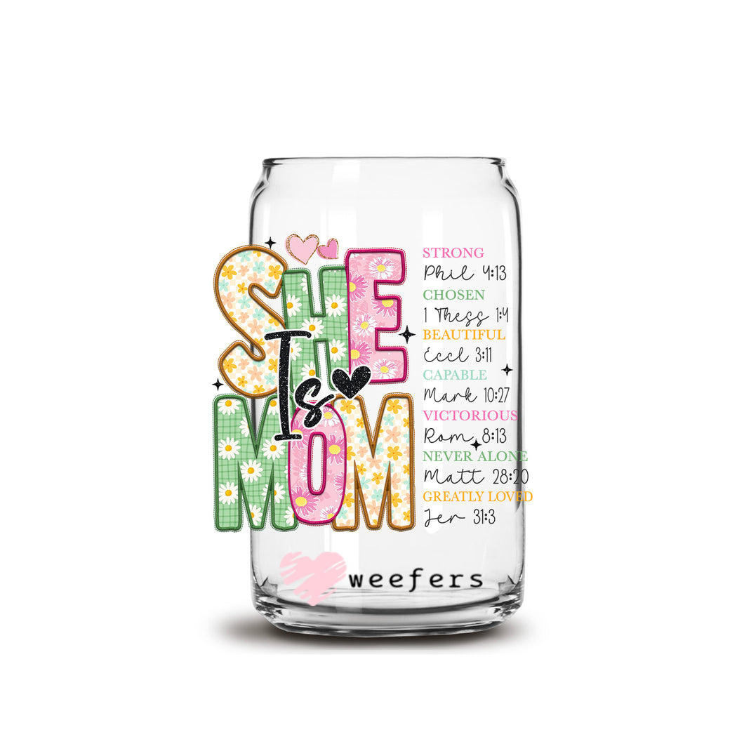 a glass jar with the words she is mom written on it