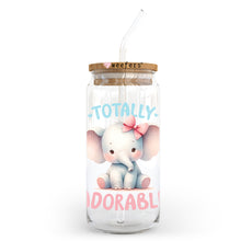 Load image into Gallery viewer, a glass jar with an elephant and a straw in it
