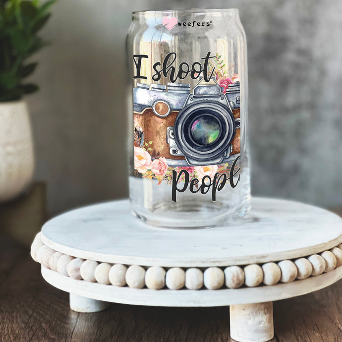 a glass jar with a picture of a camera on it