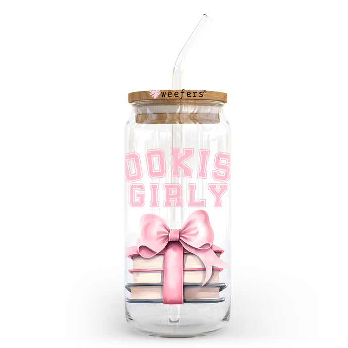 a glass jar with a straw and a pink bow