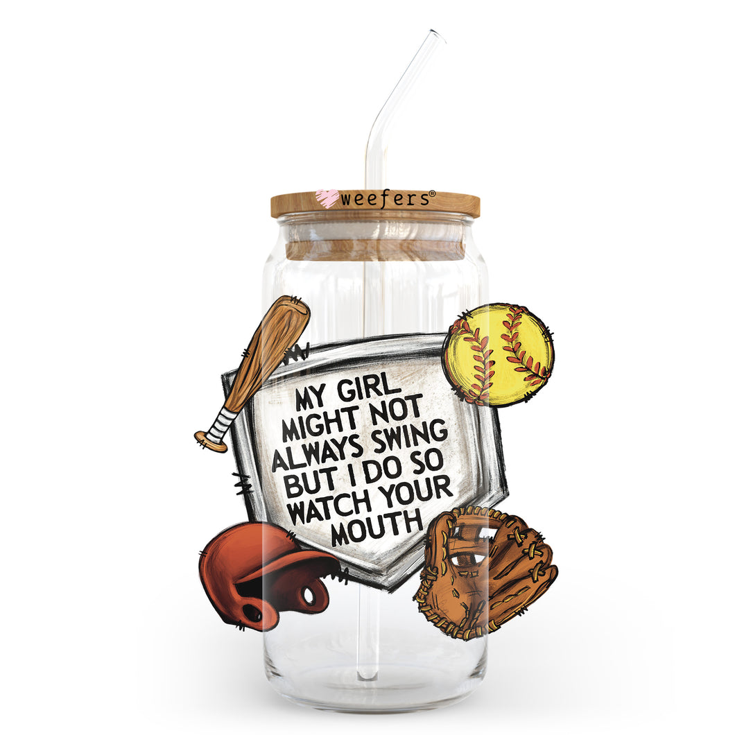 a glass jar with some baseball items inside of it