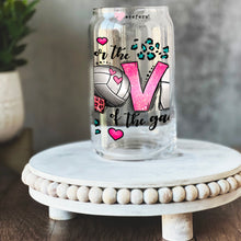 Load image into Gallery viewer, a glass jar with a volleyball design on it
