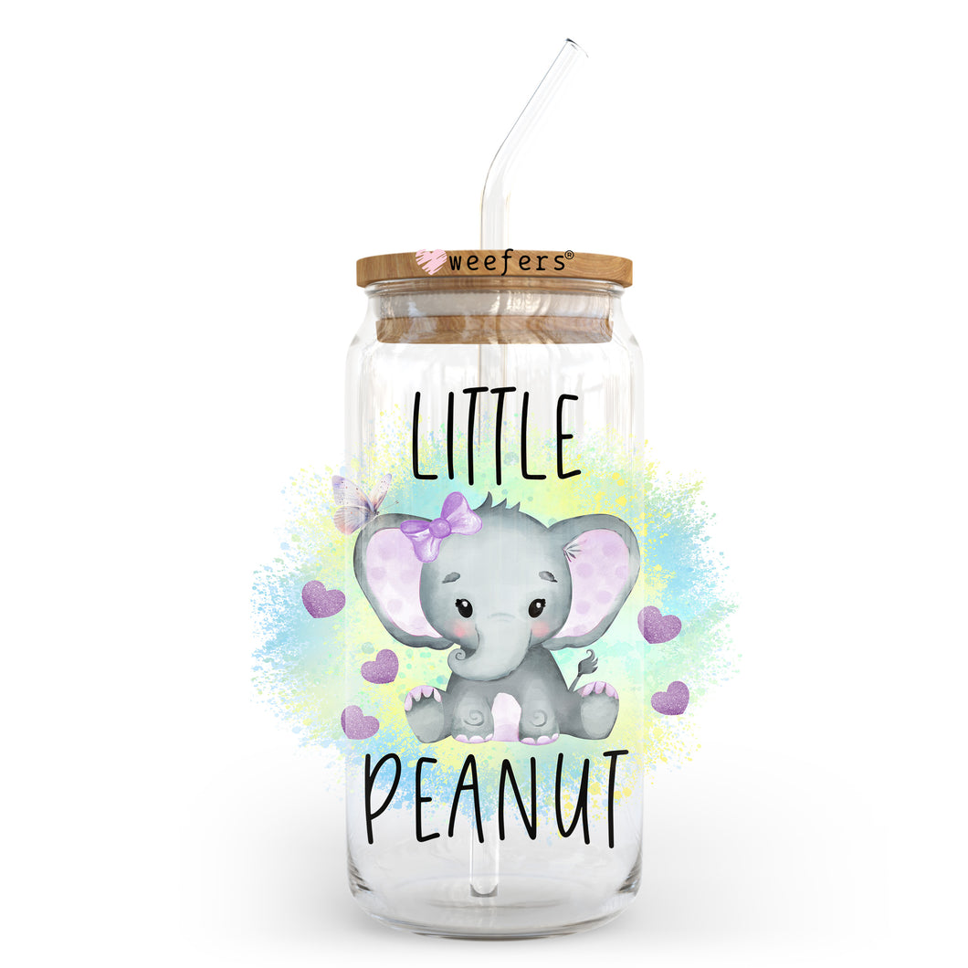 a glass jar with a baby elephant inside of it