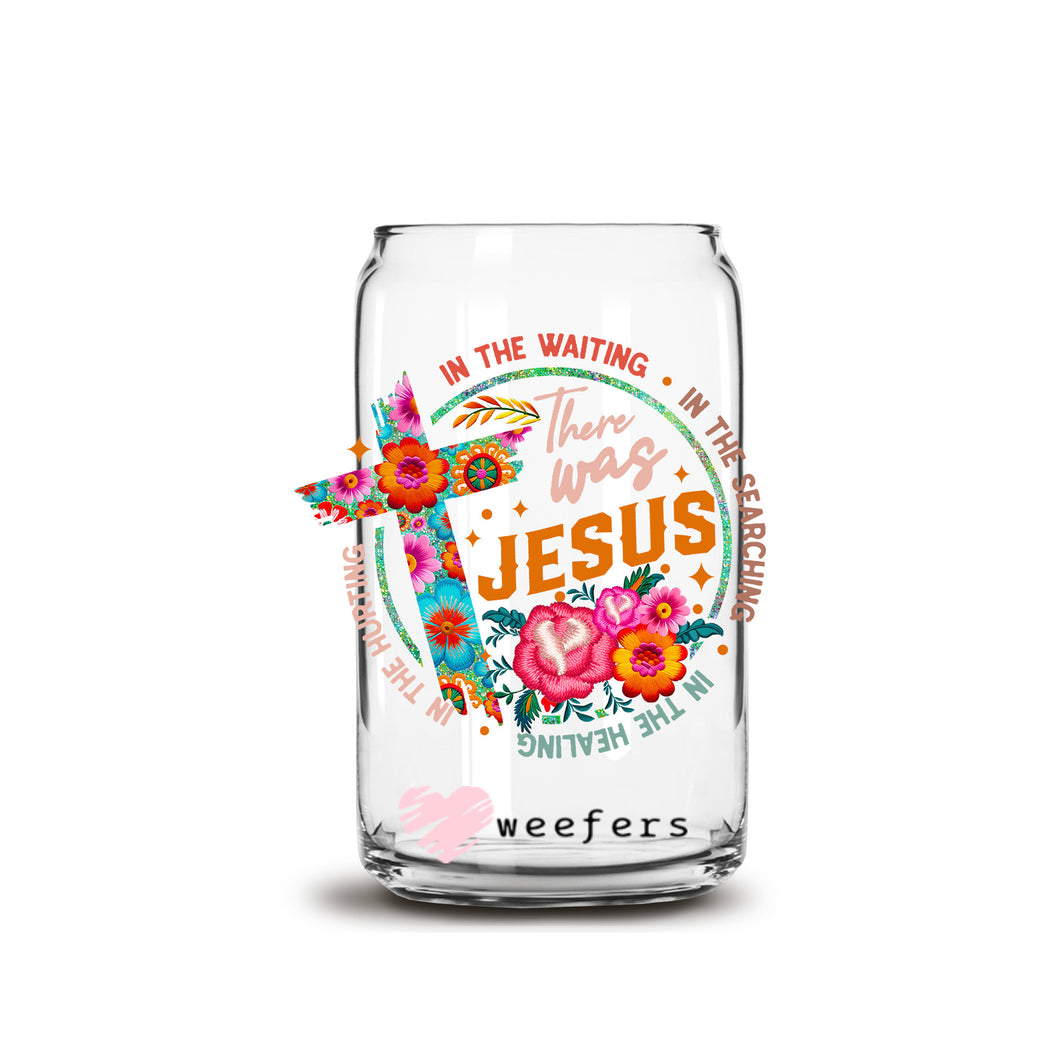 a glass jar with a picture of jesus on it
