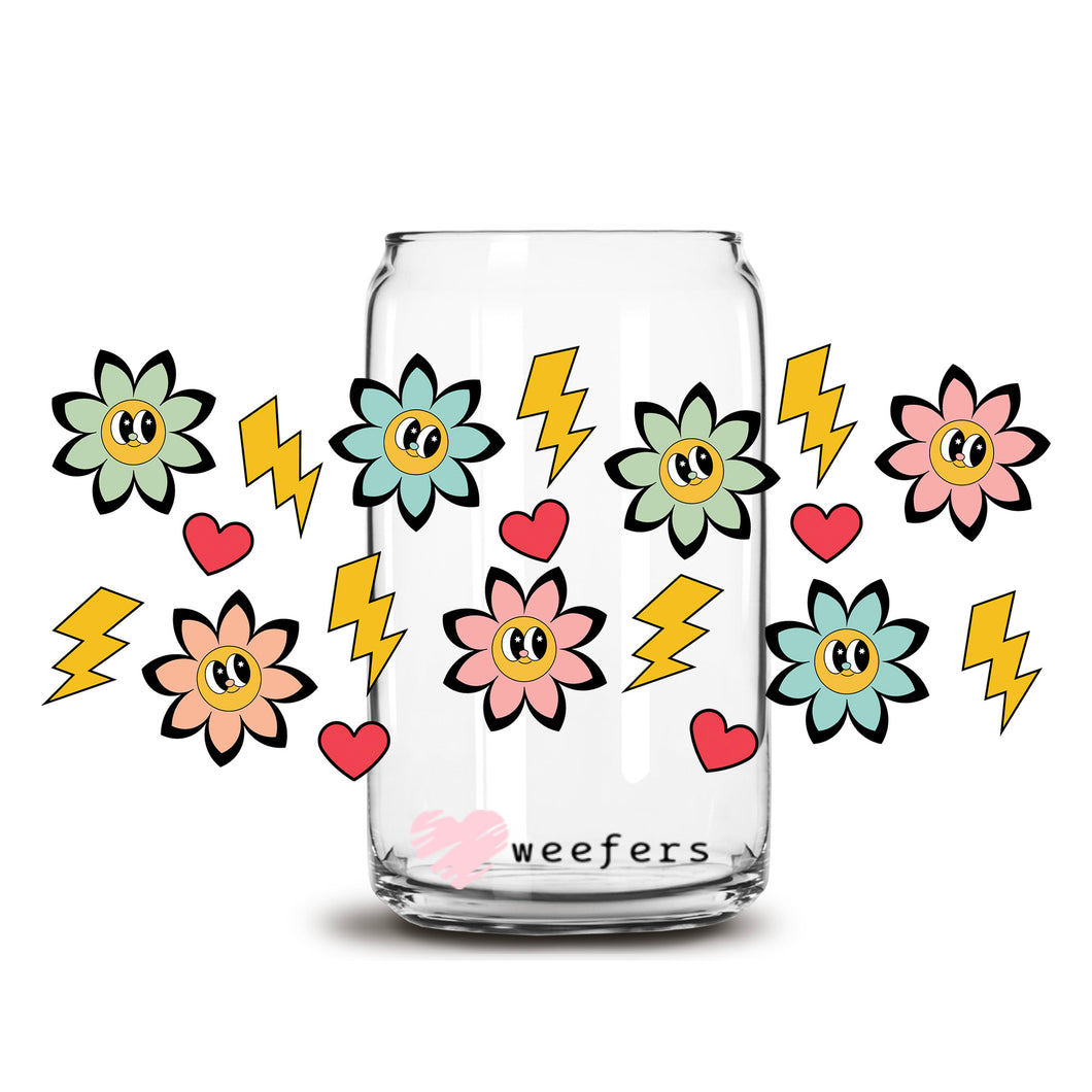 a glass jar with flowers and lightnings on it