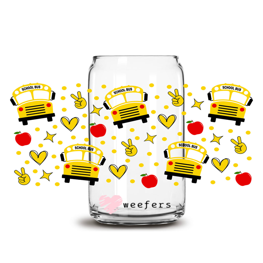 a glass jar with a school bus pattern on it