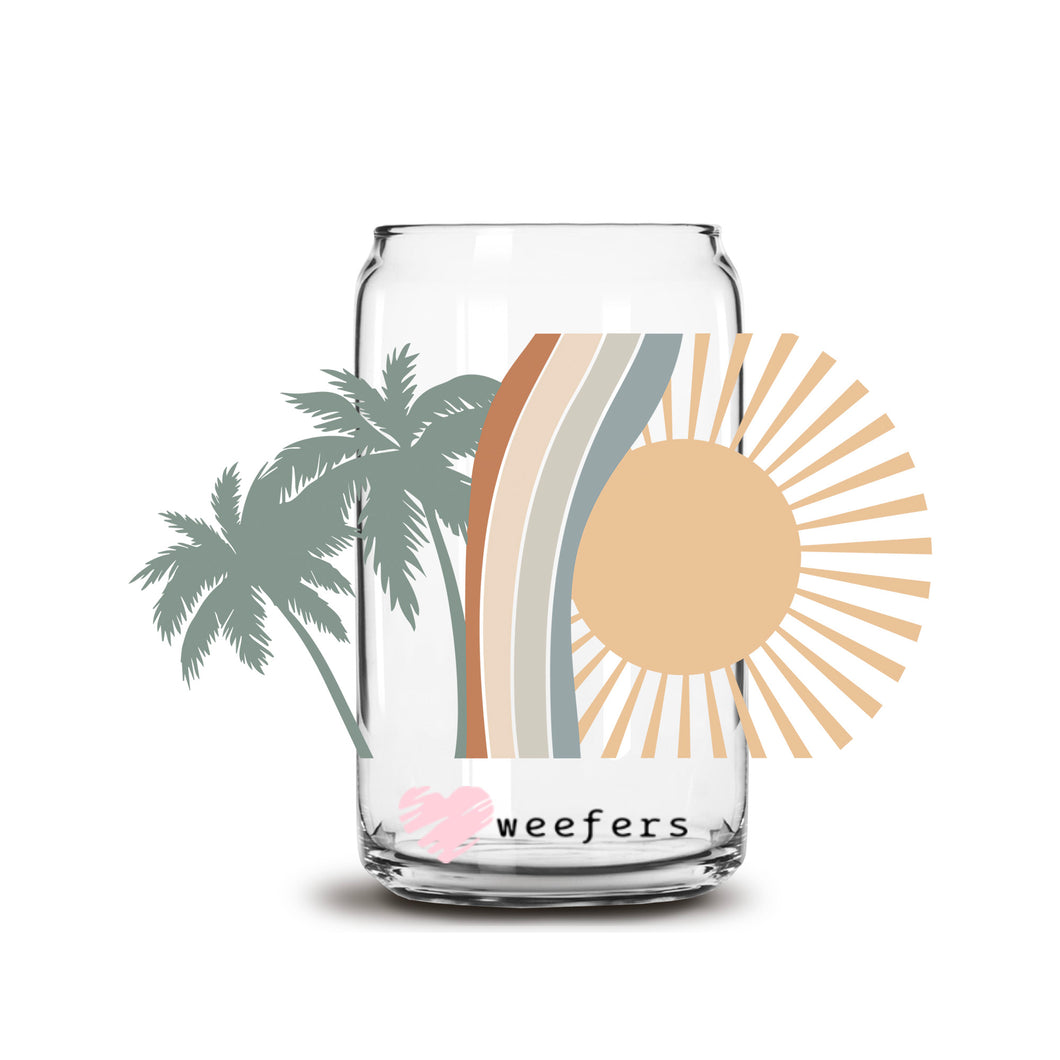 a glass jar with a palm tree in the background