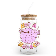 Load image into Gallery viewer, a glass jar with a straw in it that says not a hugger
