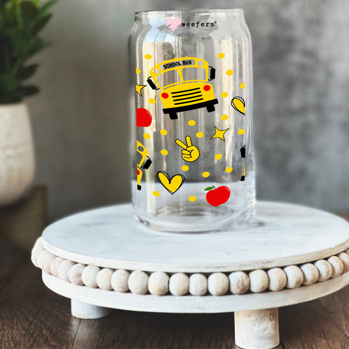 a glass jar with a picture of a school bus on it