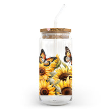 Load image into Gallery viewer, a glass jar with sunflowers and butterflies painted on it
