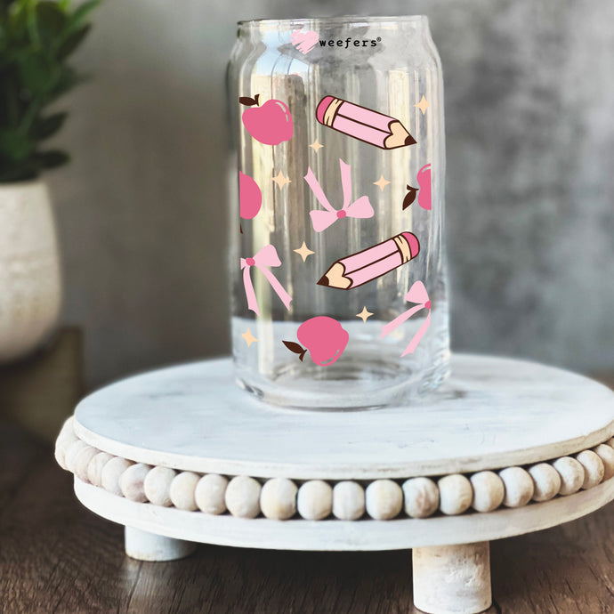 a glass jar with pink lipstick and stars on it