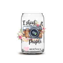 Load image into Gallery viewer, a glass jar filled with a camera and flowers
