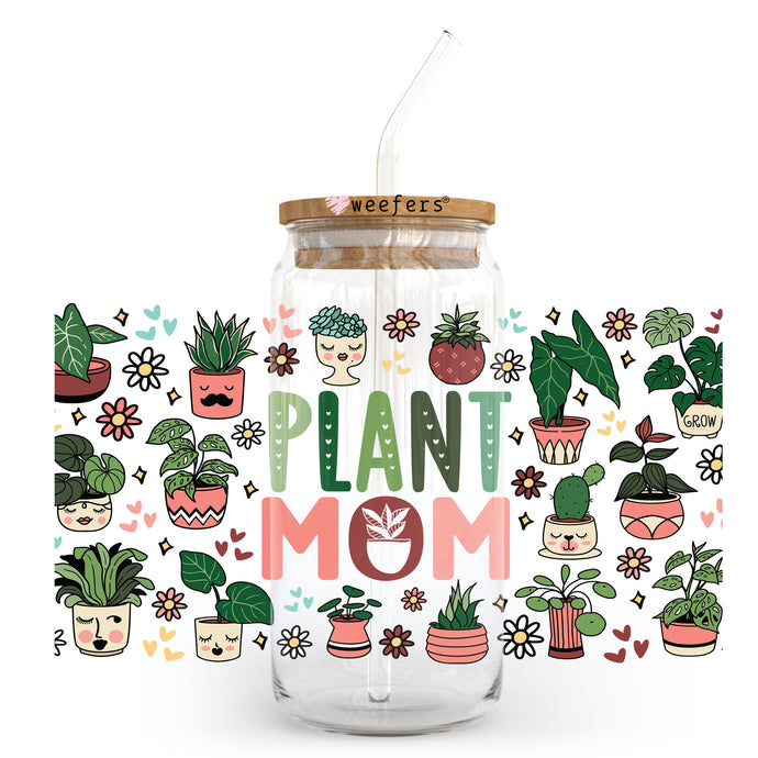 a glass jar with a plant mom sticker on it