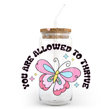 Load image into Gallery viewer, a jar with a straw in it with a butterfly on it
