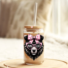 Load image into Gallery viewer, a glass jar with a straw and a bear wearing sunglasses
