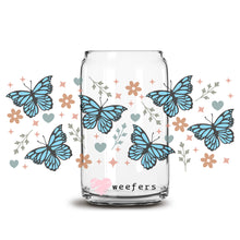Load image into Gallery viewer, a glass jar filled with blue butterflies on a white background
