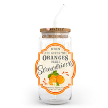 Load image into Gallery viewer, a glass jar filled with oranges and a straw
